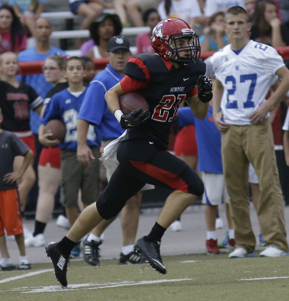 Newports Brian Burton runs the opening kick off for a touchdown during their football game against Walton Verona, Friday, Aug. 30,2014. 