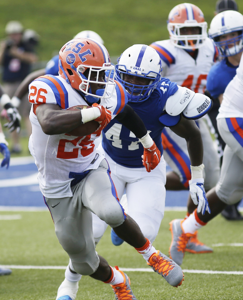 East St. Louis running back Natereace  Strong runs for a touchdown. 