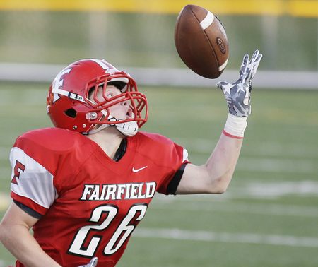 Zack Waddell tips the ball away from Withrow's Doryan Beach 